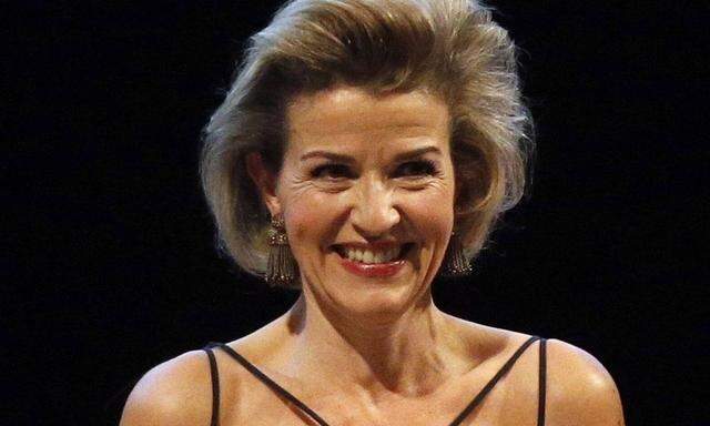 German violinist Anne Sophie Mutter C smiles after receiving the Yehudi Menuhin Award from Spanish