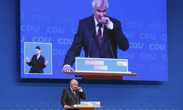 Bavarian Prime Minister and head of the CSU Seehofer makes a speech at the CDU party congress in Karlsruhe