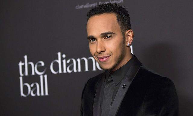 Mercedes Formula One driver Hamilton poses at the First Annual Diamond Ball fundraising event at The Vineyard in Beverly Hills