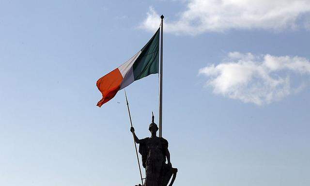 The Irish flag flies above the General Post Office on O'Connell Street in Dublin