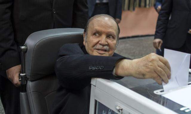 Algeria's President Abdelaziz Bouteflika casts his ballot during the presidential election in Algiers