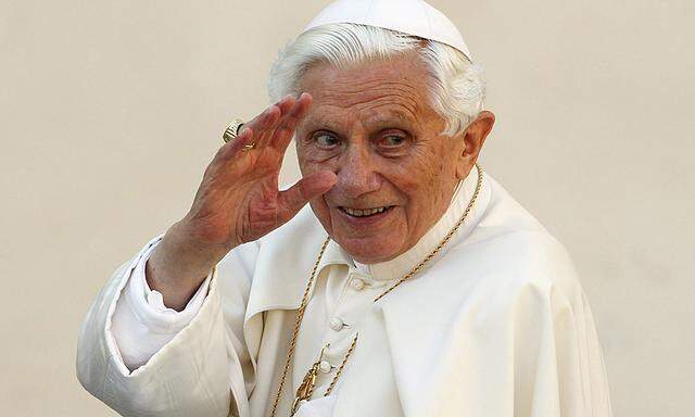 File photo of Pope Benedict XVI waving as he arrives to lead the Wednesday general audience in Saint Peter´s square at the Vatican