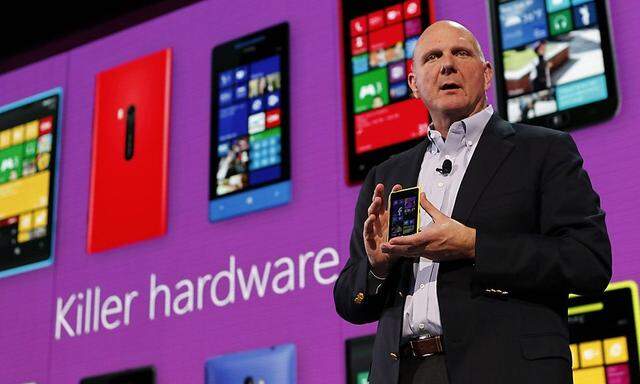 Microsoft Corp CEO Steve Ballmer displays a Nokia Lumia 920 featuring Windows Phone 8 during an event in San Francisco