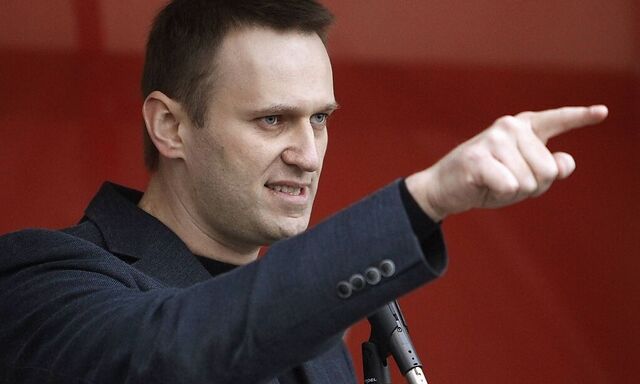 Russian opposition leader and anti-corruption blogger Alexei Navalny addresses supporters during a protest rally in Moscow
