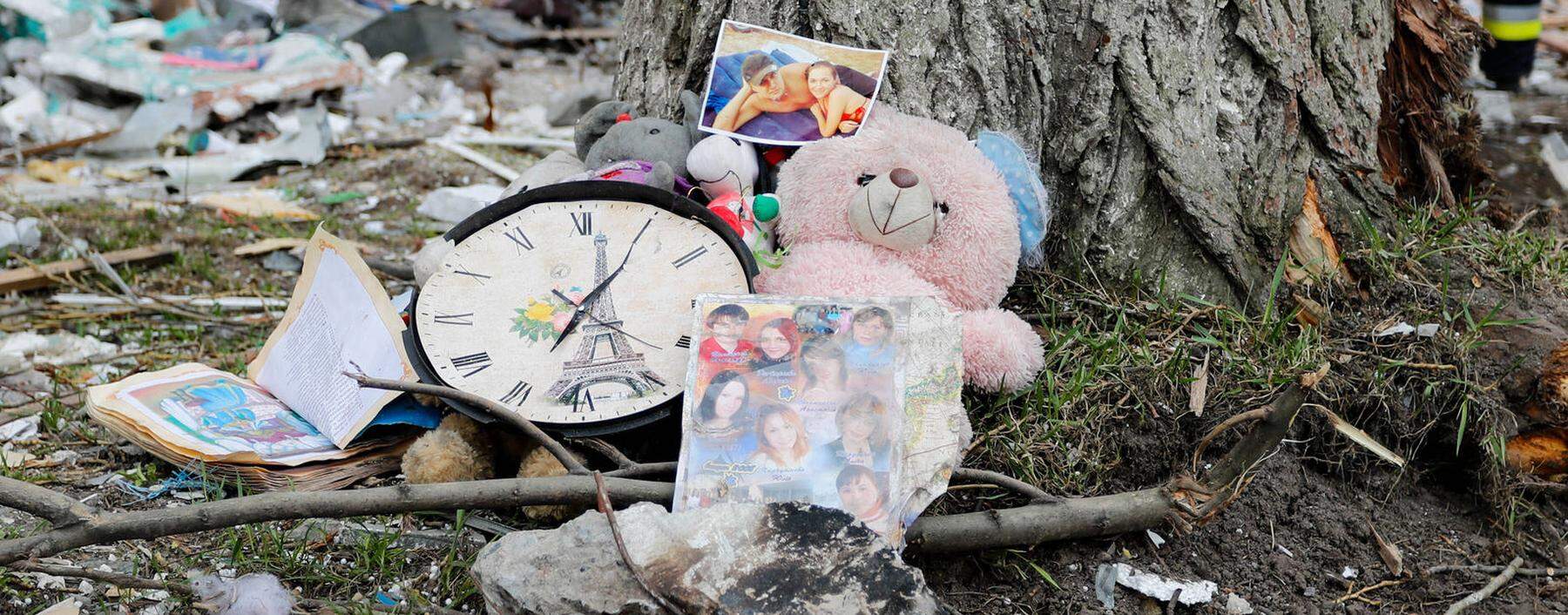 Aftermath Of Russian Attacks On Borodyanka, Ukraine Items such as family photos and a doll are seen near the wreckage o