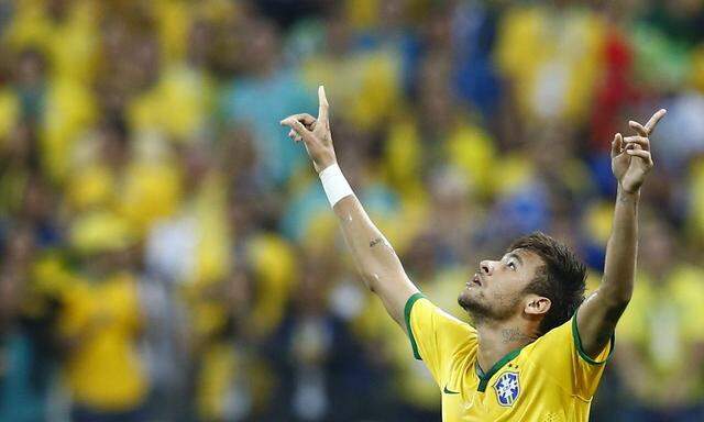 Brazil's Neymar celebrates a goal during the 2014 World Cup opening match between Brazil and Croatia at the Corinthians arena in Sao Paulo