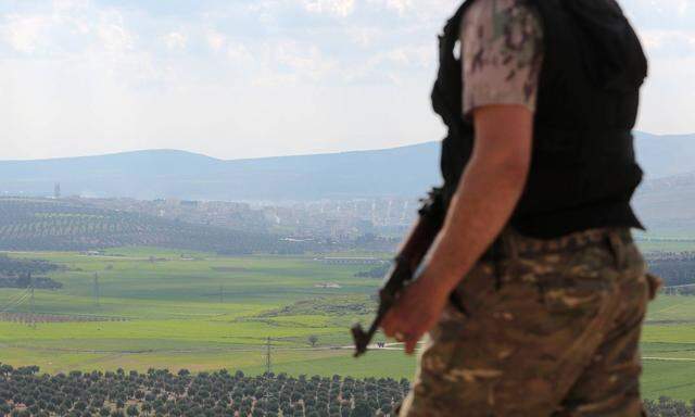 180314 AFRIN SYRIA March 14 2018 A Turkish allied Free Syrian Army FSA soldier obse