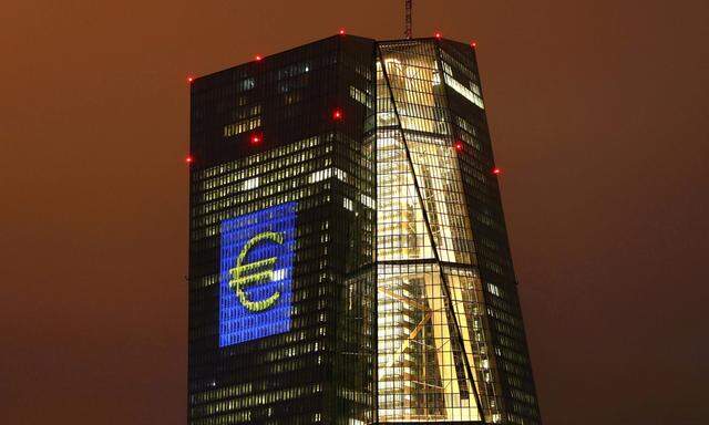 Headquarters of the European Central Bank (ECB) is seen illuminated with a giant euro sign at the start of the ´Luminale, light and building´ event in Frankfurt