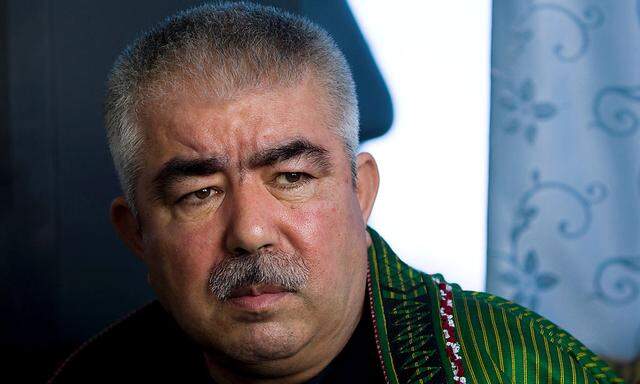 Afghan General Dostum speaks during an interview with Reuters at his Palace in Shibergan