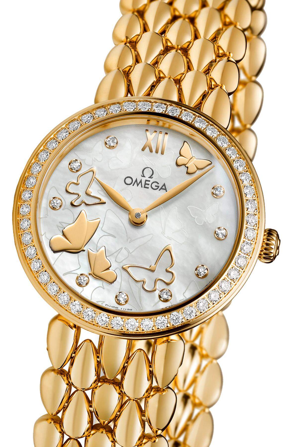 Der elegante Look der neuen „De Ville Prestige Dewdrop“ von Omega orientiert sich an der Omega-eigenen Schmuckkollektion. Die Uhr mit ihrem fein gearbeiteten Armband in Tautropfenform ist entweder in Gelb- oder Rotgold und in zwei Größen (32,7 und 27,4 mm) erhältlich.