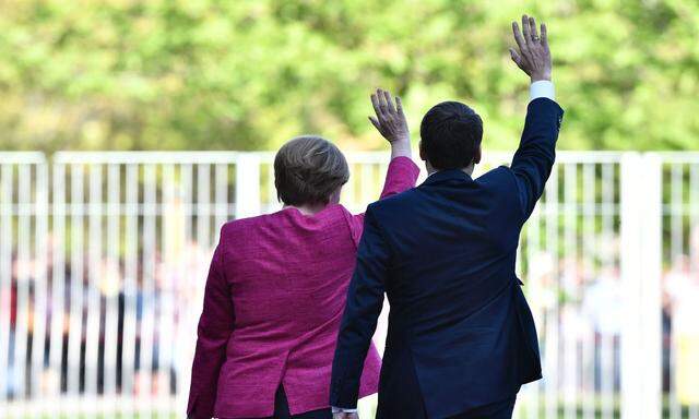 Sie sagen „Danke schön“ und „Auf Wiedersehen“: Angela Merkel und Emmanuel Macron hatten vier Jahre lang Europas Führungsrolle inne. 