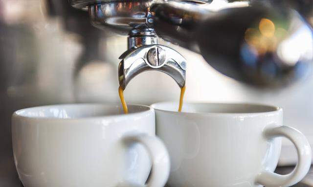 Coffee machine preparing two cups of coffee property released PUBLICATIONxINxGERxSUIxAUTxHUNxONLY DI