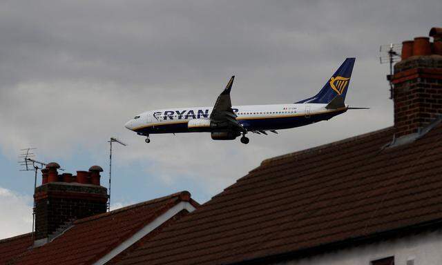 A Ryanair plane prepares to land at Manchester Airport in Manchester northern England.