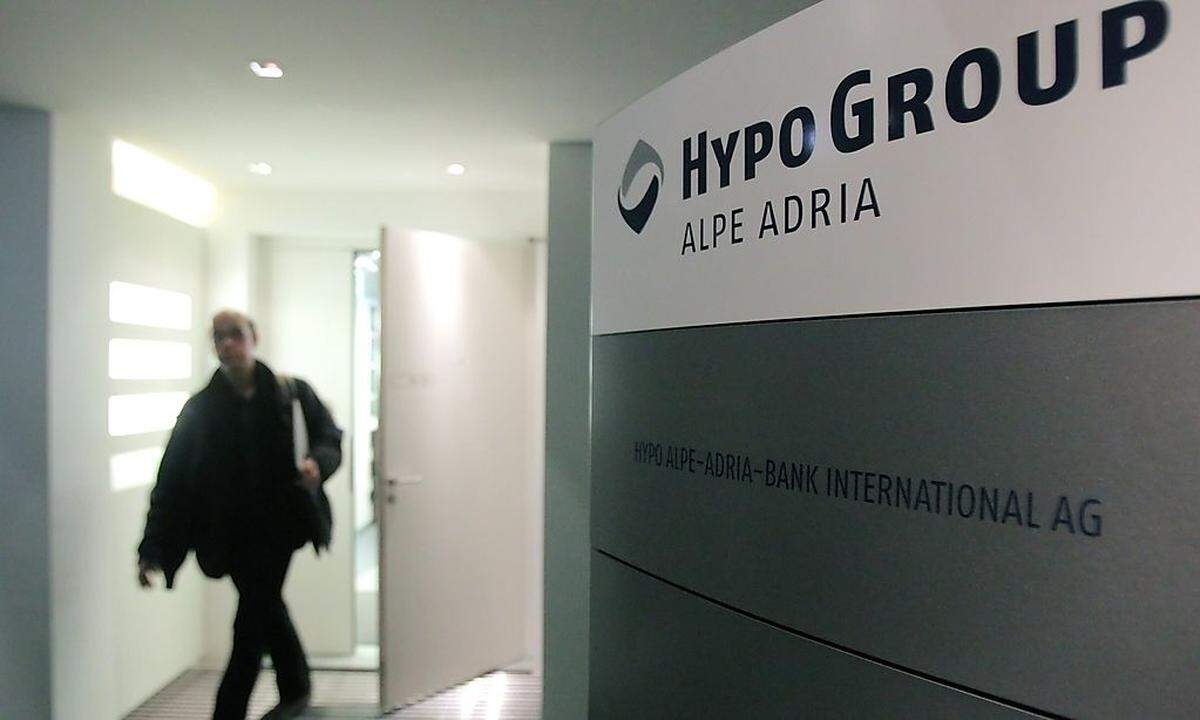 A man leaves the office of nationalised Austrian lender Hypo Alpe Adria in Vienna