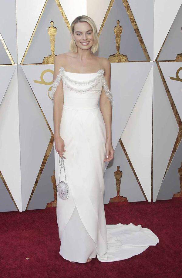 Margot Robbie, nominiert als beste Hauptdarstellerin für "I Tonya", hatte zwar die gleiche Idee, setzte sie in Chanel aber dezenter um.