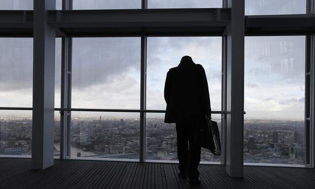 A man looks out from The View gallery at the Shard, western Europe´s tallest building, in London