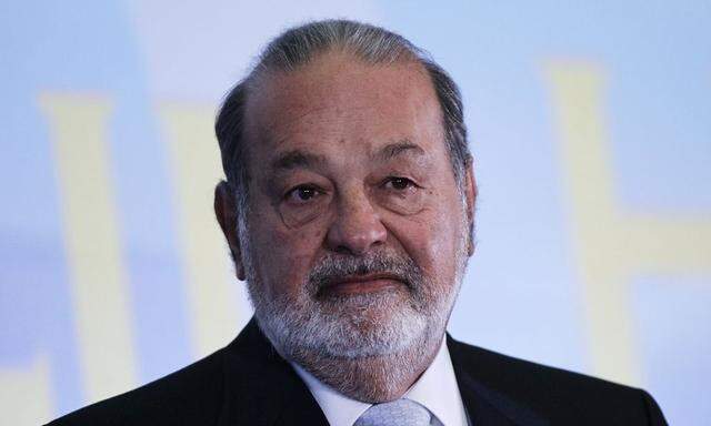 Mexican billionaire Carlos Slim looks on before a speech at Mexico's school of engineers during an event to mark the 50th anniversary of his engineering degree, in Mexico City
