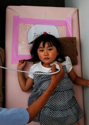 Kinder wie die vierjährige Maria Sakamoto aus Iwaki, etwas südlich von Fukushima, haben ein hohes Risiko, an Schilddrüsenkrebs zu erkranken.