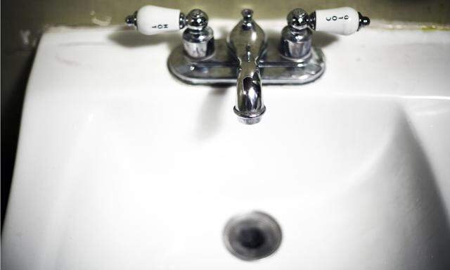 a white classical sink