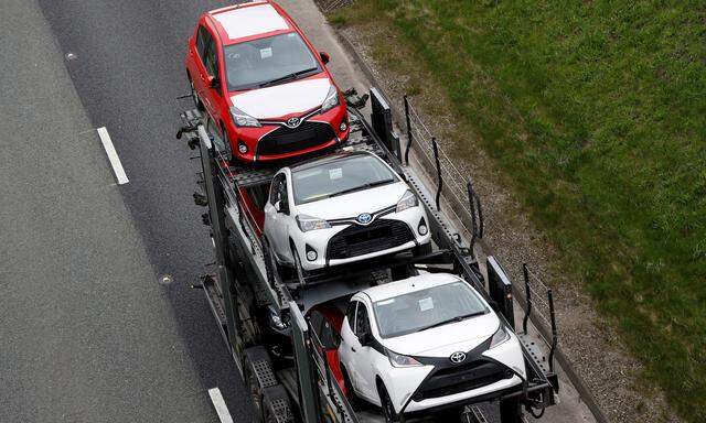 New Toyota cars are transported from their manufacturing facility in Burnaston