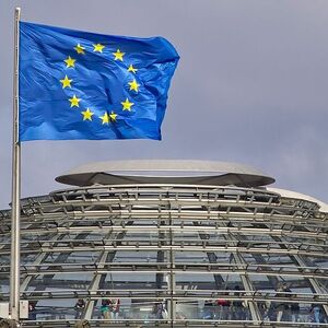 The European Union flag is seen above the cupola of the Reichstag building, the seat of the Bundestag, the German lower house of parliament, in Berlin