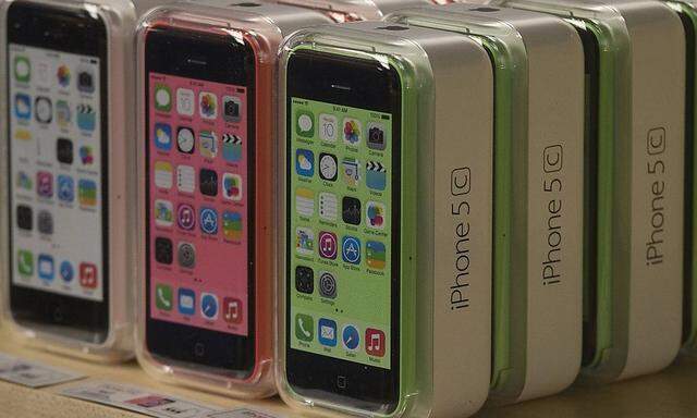 Apple iPhone 5c phones are pictured at the Apple retail store on Fifth Avenue in Manhattan, New York