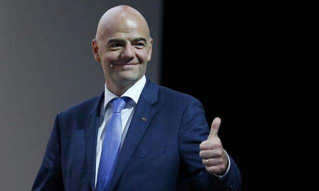 Newly elected FIFA President Infantino gives a thumb up as he arrrives for a news conference during the Extraordinary FIFA Congress in Zurich