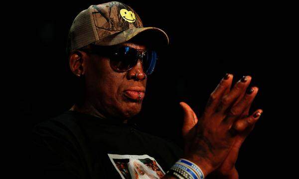 FILE PHOTO: Former NBA player Dennis Rodman poses for a portrait in Los Angeles