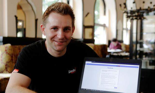 FILE PHOTO: Austrian lawyer and privacy activist Schrems displays his Facebook account´s updated terms page during a Reuters interview in Vienna