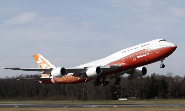 The Boeing 747-8 Intercontinental takes off on its maiden flight from Paine Field, in Everett, Washington