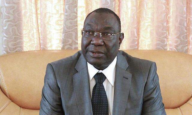 File photo shows Central African Republic's interim President Michel Djotodia sitting during a conference in Bangui