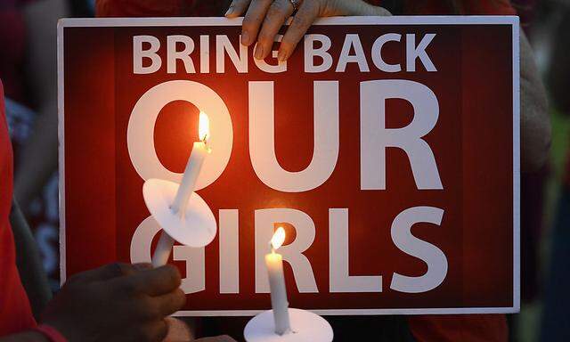 People participate in a ´Bring Back Our Girls´ campaign on Mother´s Day in Los Angeles