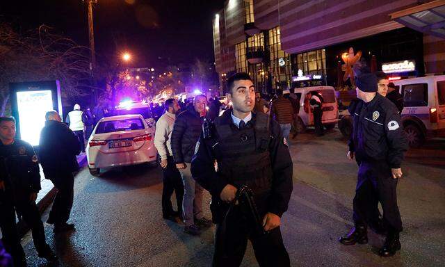 Turkish police secure the area near an art gallery where the Russian Ambassador to Turkey Andrei Karlov was shot in Ankara