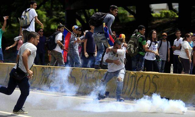 May 15 2017 Valencia Carabobo Venezuela Protesters clash against police during a demonstratio