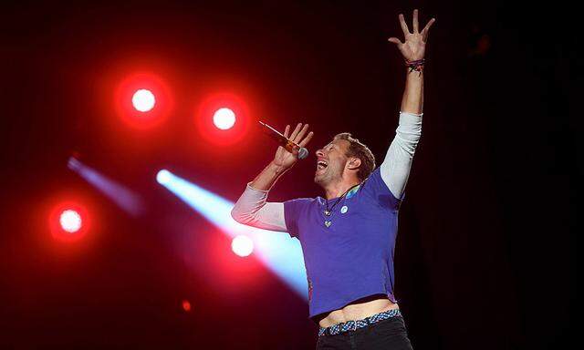 Chris Martin of Coldplay performs during the fifth annual Made in America Music Festival in Philadelphia, Pennsylvania