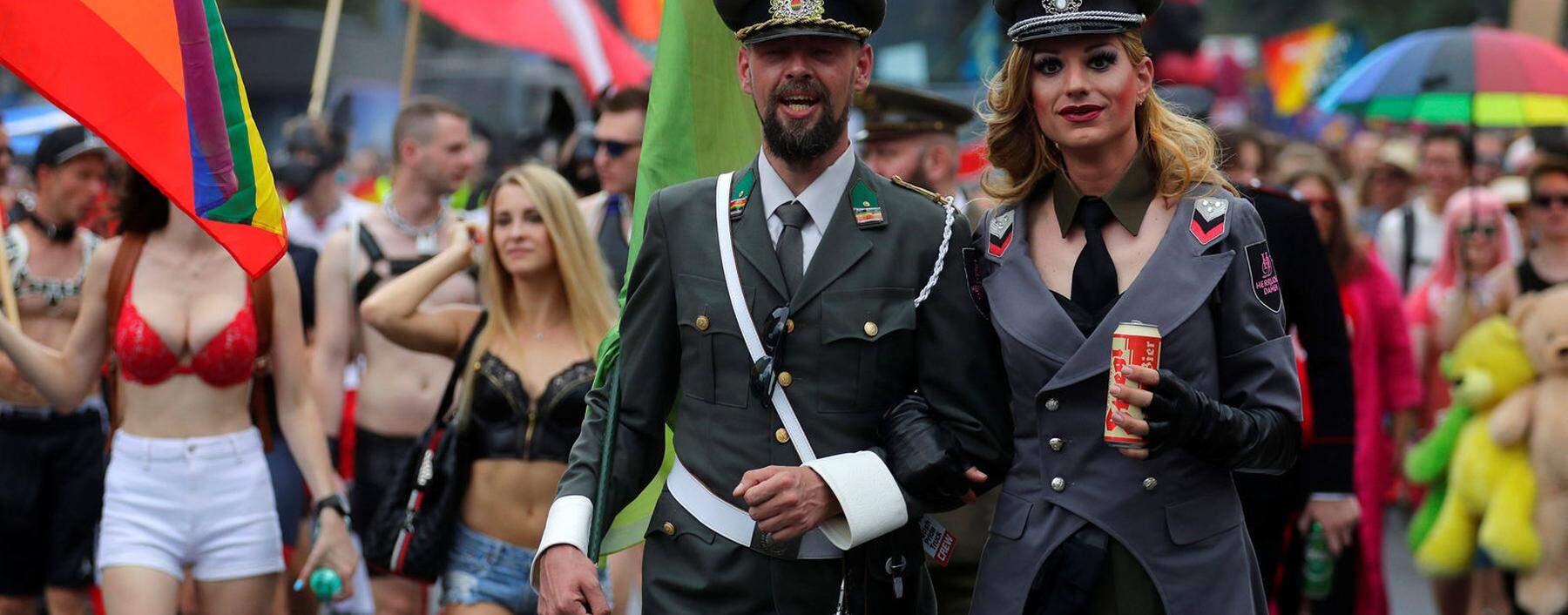 Revellers participate in Regenbogenparade gay pride parade in Vienna