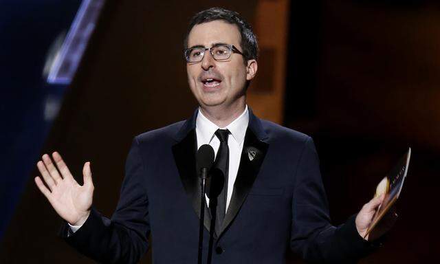 John Oliver presents the award for Outstanding Directing For A Limited Series, Movie Or A Dramatic Special at the 67th Primetime Emmy Awards in Los Angeles