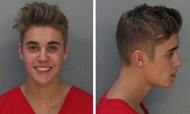 Combination photo of booking photos of Canadian teen pop singer Bieber in Miami Beach