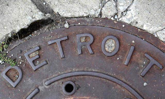 ´Detroit´ is seen on the top of an iron man-hole cover on a street in Detroit