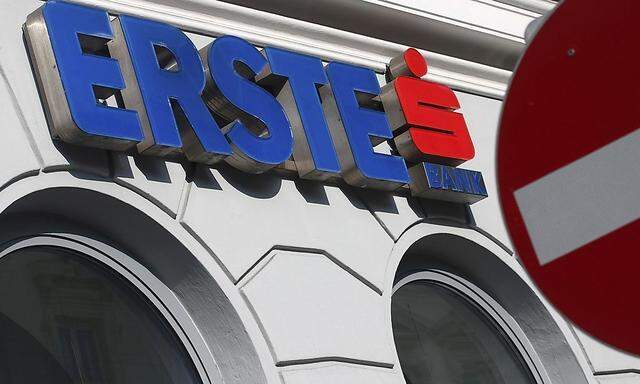 The logo of Erste Group Bank is pictured behind a traffic sign at a branch office in Vienna