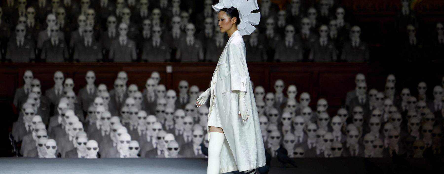 A model presents a creation by designer Thom Browne as part of his Haute Couture Fall/Winter 2023-2024 collection show at the Opera Garnier in Paris, France, July 3, 2023. REUTERS/Sarah Meyssonnier