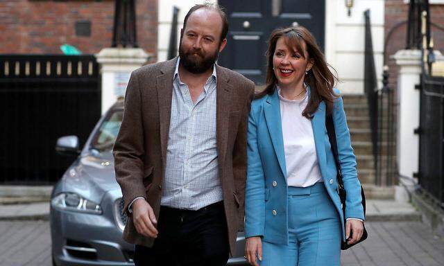 Nick Timothy and Fiona Hill, Britain's Prime Minister Theresa May's closest advisors, leave the Conservative Party headquarters, in London