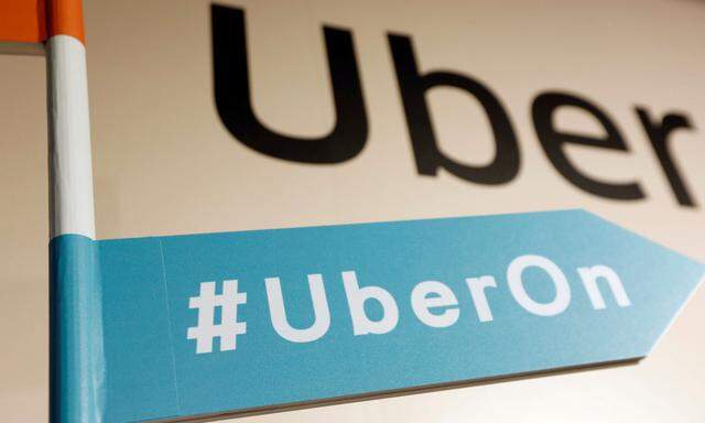 A sign is seen during a news conference to announce Uber resumes ride-hailing service, in Taipei
