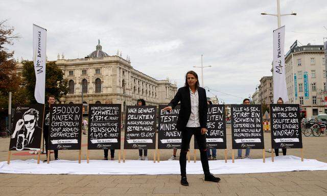 Candidate for upcoming presidential elections Dominik Wlazny presents his election campaign posters in Vienna