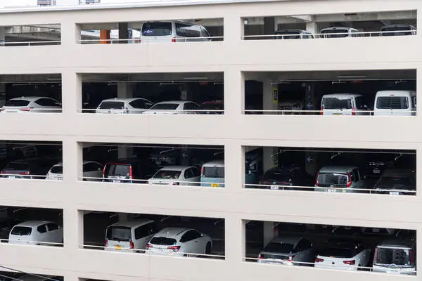 Cars in a multi-story parking garage.