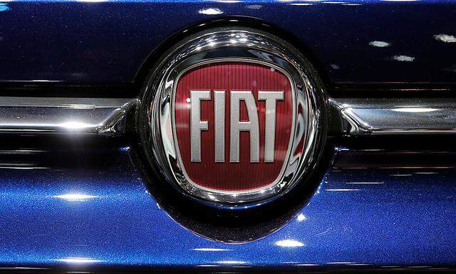 A Fiat car logo is seen on media day at the Paris auto show
