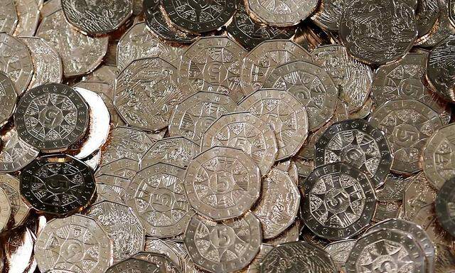 Five Euro coins are seen in the Austrian Mint headquarters in Vienna