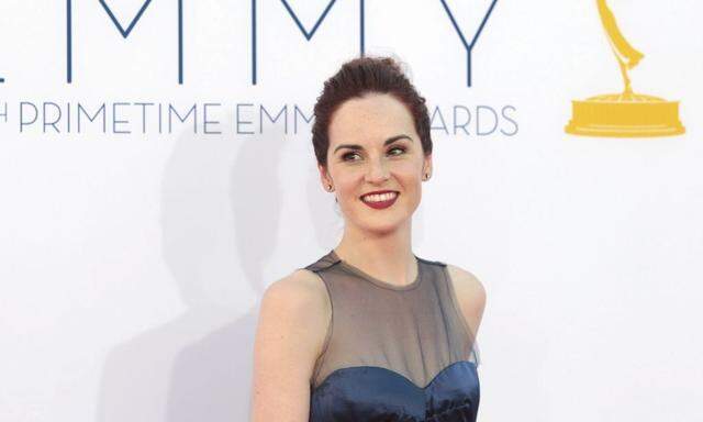 British actress Michelle Dockery of the drama series 'Downtown Abbey' arrives at the 64th Primetime Emmy Awards in Los Angeles