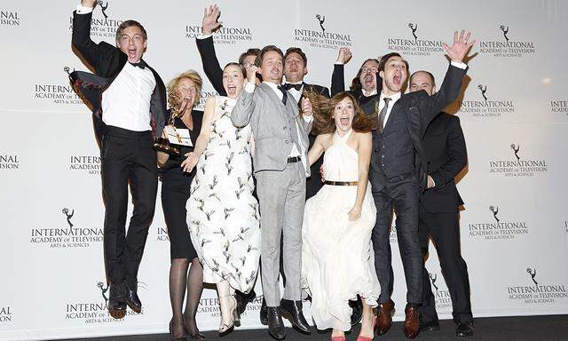 TV Movie/Miniseries award recipients, the cast and crew of the series ´Generation War´ celebrate backstage at the 42nd International Emmy Awards in New York