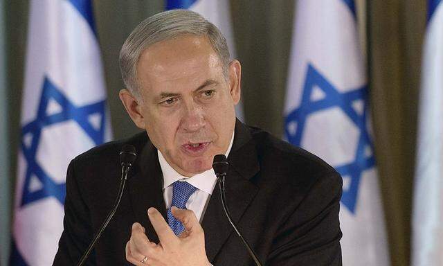 Israel PM Netanyahu speaks during joint news conference with French President at his residence in Jerusalem